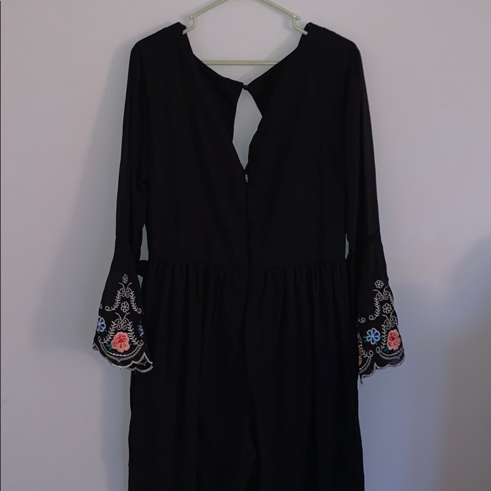 Black long sleeve, wide leg jump suit w floral arm - Picture 3 of 4